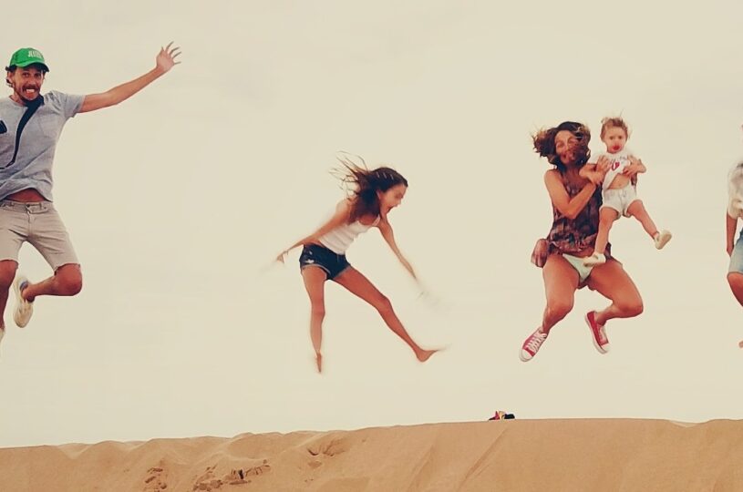 Active family jumping in the air