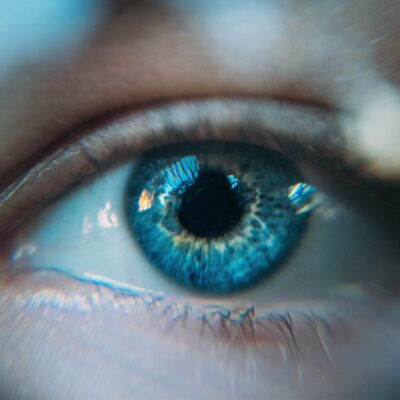 close up of woman's blue eye